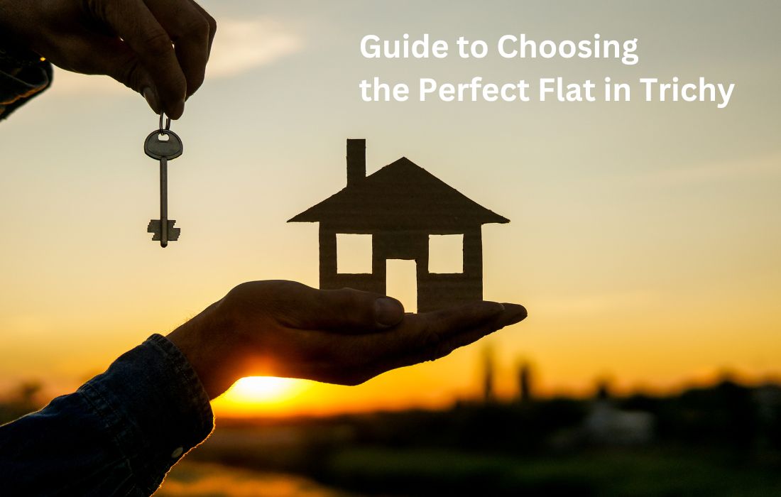 A man holding a key in one hand and a miniature home on the other hand. In the background a nice sunrise is seen. The text on the image is 'Guide to Choosing the Perfect Flat in Trichy