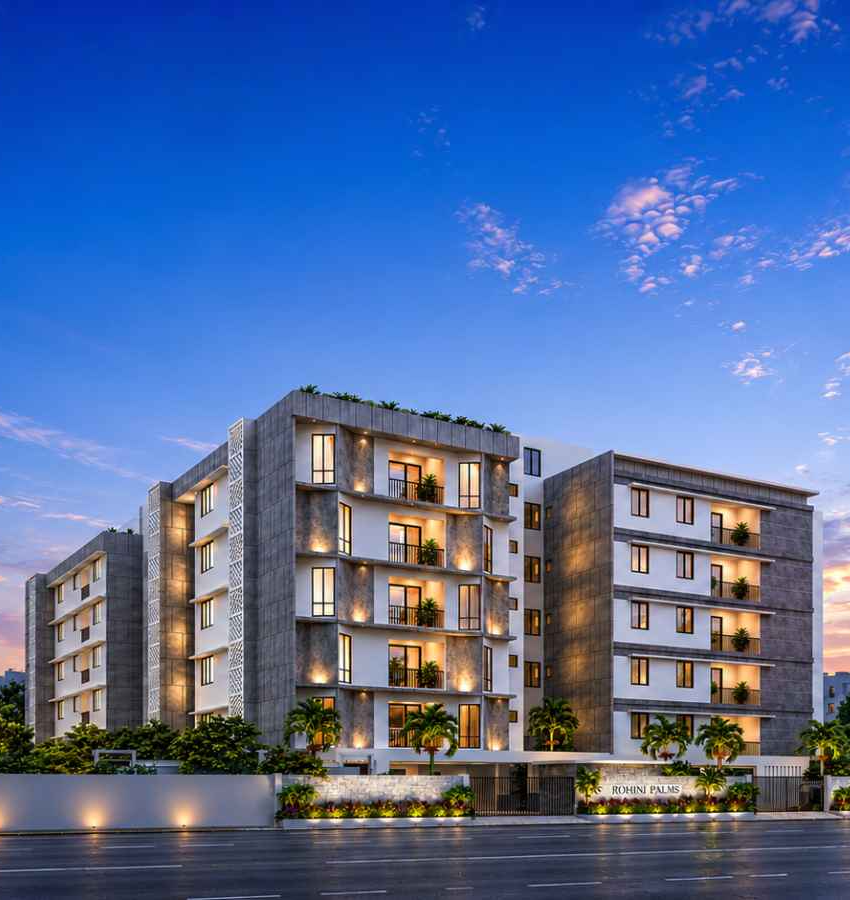 Rohini Palms Apartments in Trichy featuring modern premium residential apartments with landscaped surroundings at dusk
Title Attribute: Rohini Palms Apartments Trichy